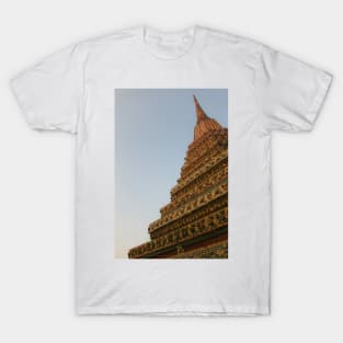 First unusual low angle view of a Buddha stupa against clear sky. T-Shirt